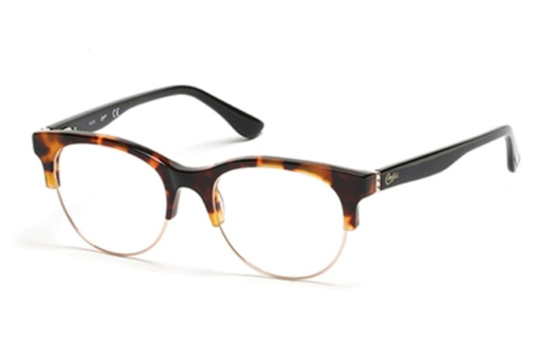 Tortoise shell eyeglasses with gold rims.