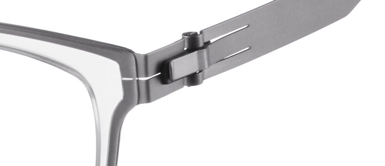 Gray and white eyeglasses hinge detail.